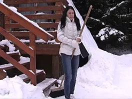 Snow shoveling teen strokes pussy