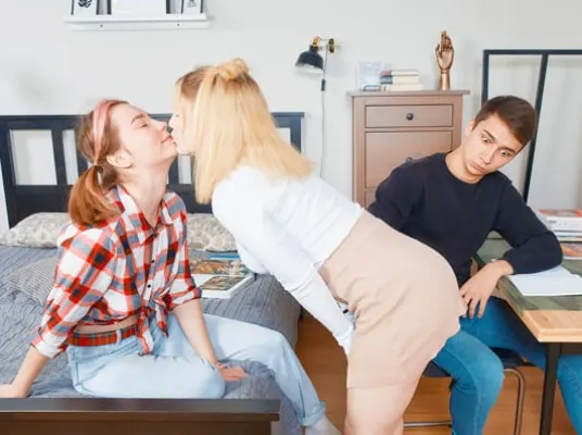Irresistible cuties tease a lad