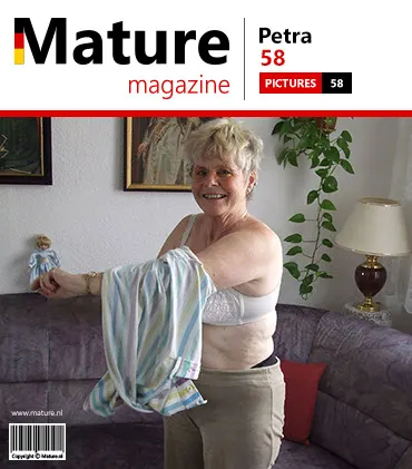 Housewife petra laying naked on the couch doing some streching