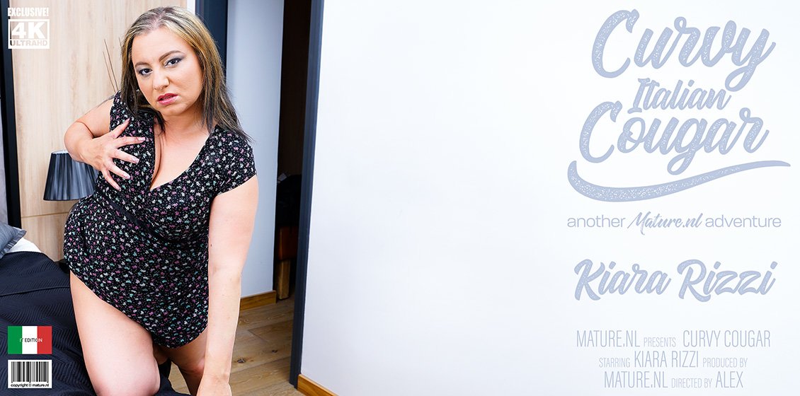 Curvy mature Kiara Rizzi goes to town with her fingers and dildo