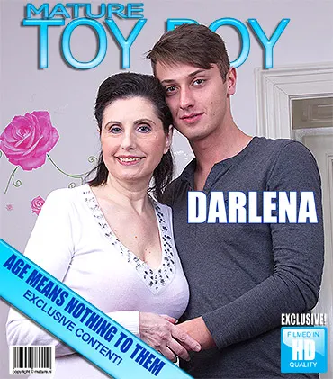 Dark-haired older lady in a white dress having a sex date with a Toyboy
