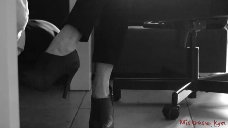 Foot worship under the desk