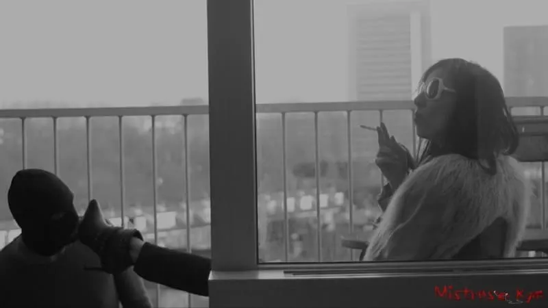 Smoking Goddess outside with her sub