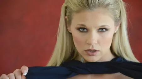 Blonde teen Scarlet Red masturbates on a table